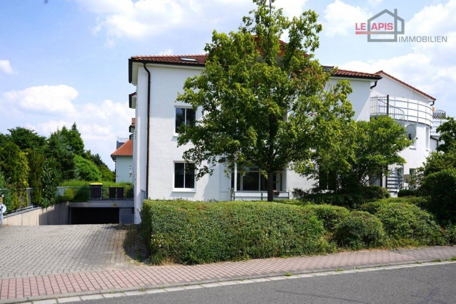 Hausansicht Bild 2 u. Tiefgarageneinfahrt Erdgeschosswohnung Leipzig