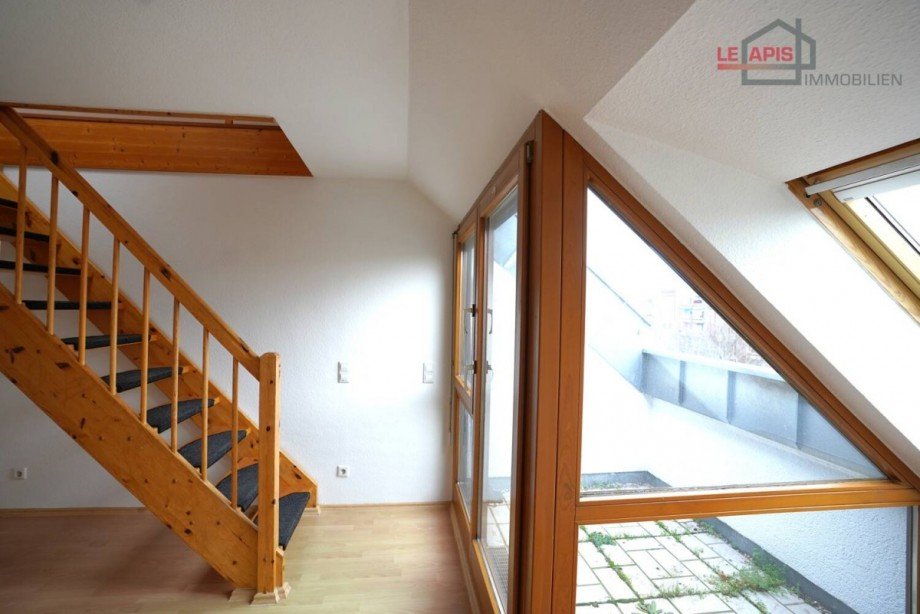 Wohn- u. Essbereich Bild 2 Dachgeschosswohnung Leipzig / Paunsdorf