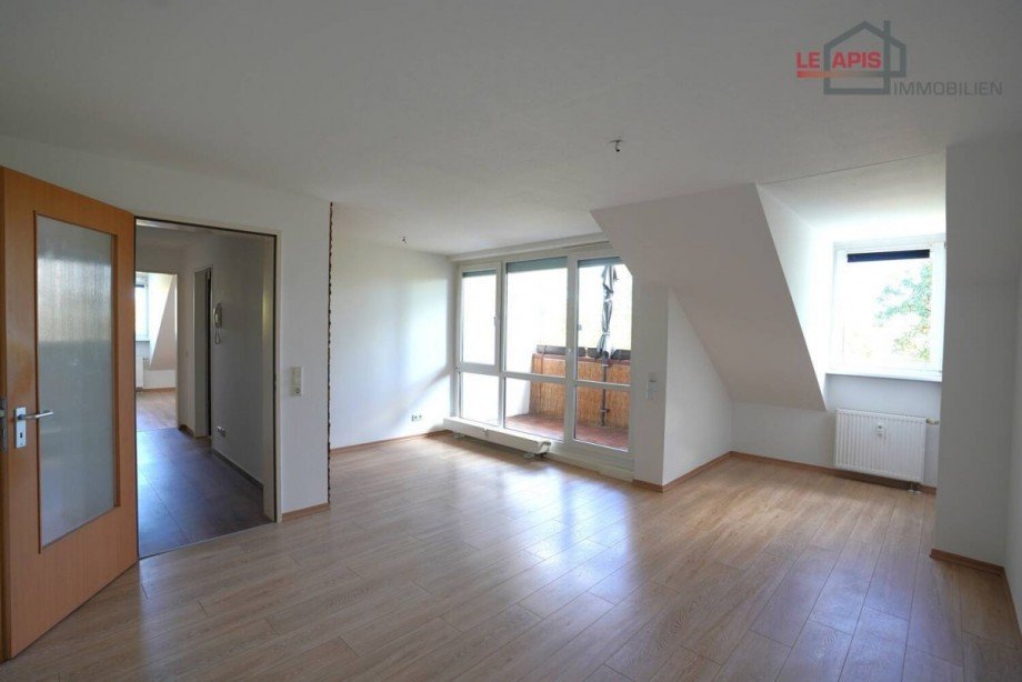 Wohnzimmer m. Balkon (Ostseite) Dachgeschosswohnung Leipzig/ Lausen