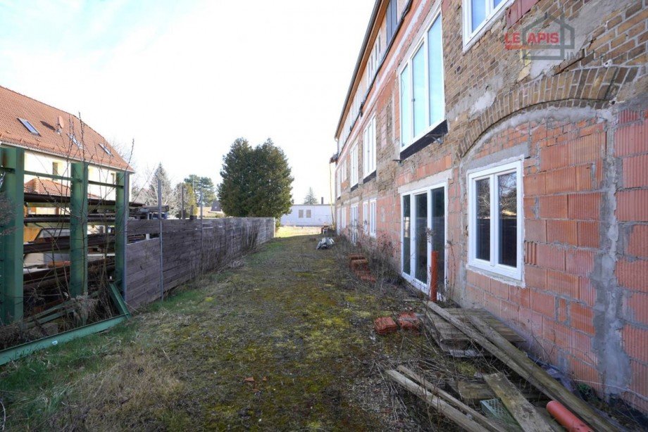 Rohbau Nordseite Haus - fr Terrassen- u. Balkonanbau Mehrfamilienhaus Leipzig / Holzhausen