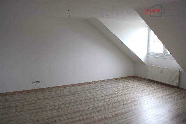 Wohnzimmer Bild 2 Dachgeschosswohnung Leipzig-Lausen